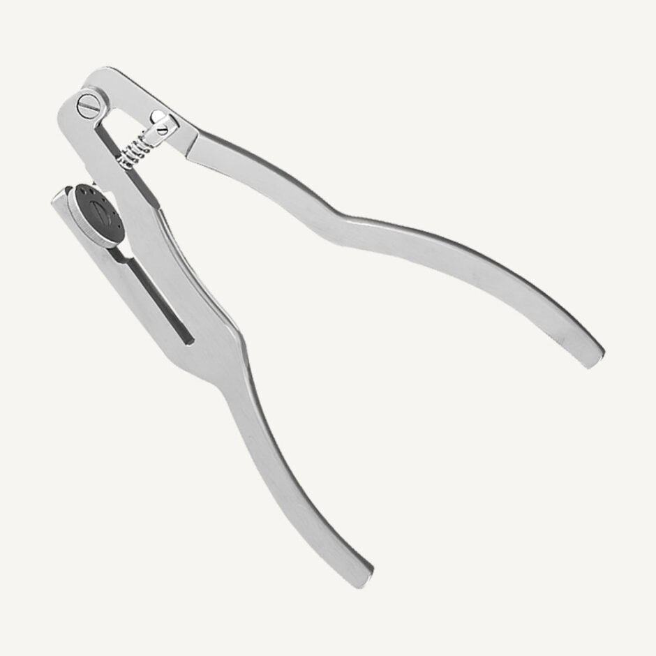 Ivory Rubber Dam Punch